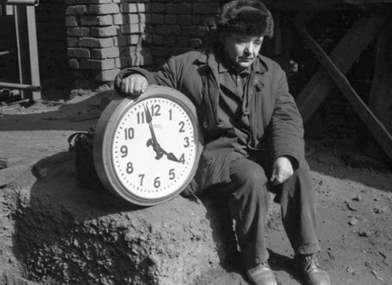 man with clock
